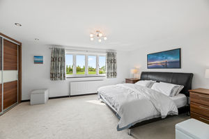 Bedroom One- click for photo gallery
